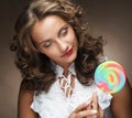 Young woman with colorful lollipop Royalty Free Stock Photo