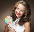 Young woman with colorful lollipop Royalty Free Stock Photo