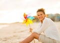 Young woman with colorful windmill toy Royalty Free Stock Photo