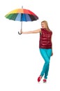 Young woman with colourful umbrella isolated Royalty Free Stock Photo