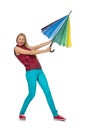 Young woman with colourful umbrella isolated Royalty Free Stock Photo