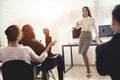 A young woman communicates with employees of the call center. Royalty Free Stock Photo