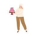 Young woman confectioner holding holiday cake vector illustration