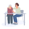 Young woman consoles senior woman Royalty Free Stock Photo