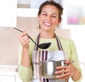 Young woman cooking Royalty Free Stock Photo