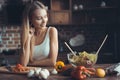 Young Woman Cooking. Healthy Food - Vegetable Salad. Diet. Dieting Concept. Healthy Lifestyle. Cooking At Home. Prepare Royalty Free Stock Photo