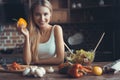 Young Woman Cooking. Healthy Food - Vegetable Salad. Diet. Dieting Concept. Healthy Lifestyle. Cooking At Home. Prepare Royalty Free Stock Photo