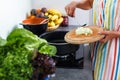 Young woman cooking in her modern kitchen Royalty Free Stock Photo