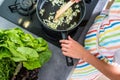 Young woman cooking in her modern kitchen Royalty Free Stock Photo