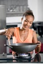 Young woman cooking at home, prepare food