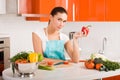 Young woman cooking in the kitchen Royalty Free Stock Photo