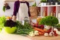 Young Woman Cooking in the kitchen. Healthy Food Royalty Free Stock Photo