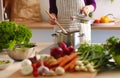 Young Woman Cooking in the kitchen. Healthy Food Royalty Free Stock Photo