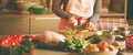 Young Woman Cooking in the kitchen. Healthy Food for Christmas stuffed duck or Goose Royalty Free Stock Photo