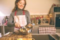 Young Woman Cooking in the kitchen. Healthy Food for Christmas stuffed duck or Goose Royalty Free Stock Photo