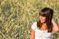 Young woman in corn field enjoy sunset Royalty Free Stock Photo