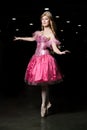 Young woman cosplayer wearing pink dress Royalty Free Stock Photo