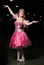 Young woman cosplayer wearing pink dress Royalty Free Stock Photo