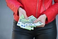 young woman count 100 euro banknotes Royalty Free Stock Photo