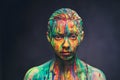 Young woman covered with a colourful paint