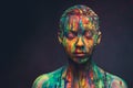 Young woman covered with a colourful paint