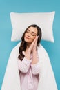 young woman covered in white duvet Royalty Free Stock Photo