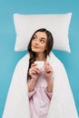 young woman covered in white duvet Royalty Free Stock Photo