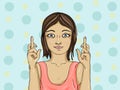 Young woman crossing her fingers. Happy girl makes a wish. Royalty Free Stock Photo