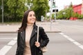 Young woman crossing street. Traffic rules Royalty Free Stock Photo