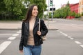 Young woman crossing street. Traffic rules and regulations Royalty Free Stock Photo