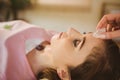 Young woman at crystal healing session