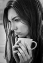 Young woman with cup of coffee or tea Royalty Free Stock Photo