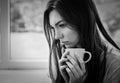 Young woman with cup of coffee or tea Royalty Free Stock Photo