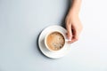 Young woman with cup of delicious hot coffee Royalty Free Stock Photo