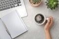 Young woman with cup of delicious hot coffee at table Royalty Free Stock Photo