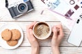 Young woman with cup of delicious hot coffee at table Royalty Free Stock Photo