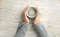 Young woman with cup of delicious hot coffee Royalty Free Stock Photo