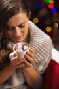 Young woman with cup of hot chocolate with marshmallow Royalty Free Stock Photo