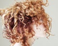 Young woman with curly colourful hair Royalty Free Stock Photo