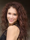 Young woman with curly dark hair