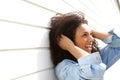 Young woman with curly hair smiling Royalty Free Stock Photo