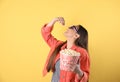 Young woman with 3D glasses eating tasty popcorn Royalty Free Stock Photo