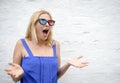 Young woman in 3d glasses surprising and screaming Royalty Free Stock Photo