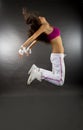 Young woman dancer jumping