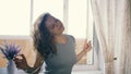 Young woman dancing with a garland in her hair. Slow motion. Winter Holidays Concept Royalty Free Stock Photo