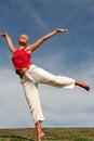 Young woman dancing on grass Royalty Free Stock Photo