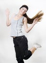 Young woman dancing with player Royalty Free Stock Photo