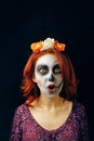 Young woman in day of the dead mask skull face art. Royalty Free Stock Photo