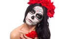 Day of the dead. Halloween. Young woman in day of the dead mask skull face art and rose. Isolated on white. closeup. Royalty Free Stock Photo