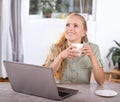 Young woman daydreaming in office Royalty Free Stock Photo